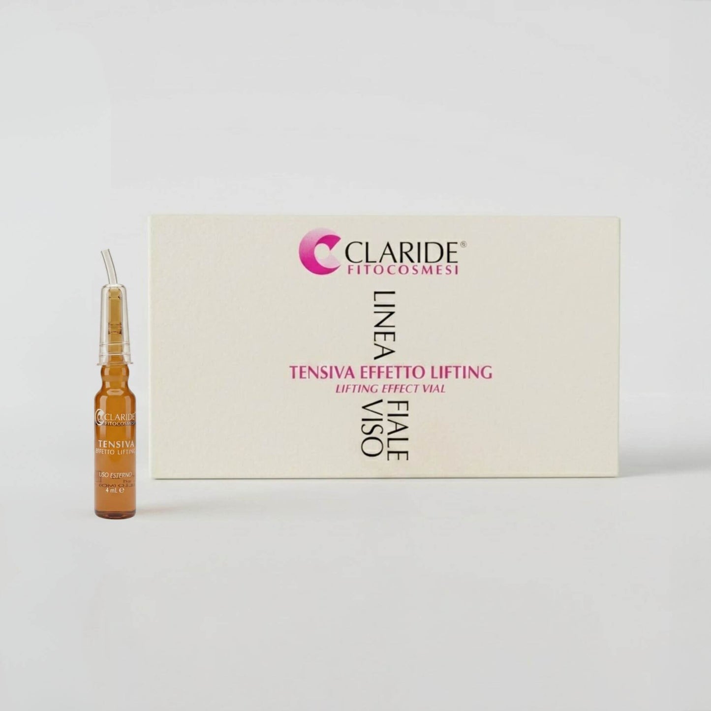 Scatola panna e fiala in vetro ambrato da 4ml con applicatore della Linea Fiale Viso Tensiva Effetto Lifting Claride Fitocosmesi. Siero concentrato ad azione tensore (Lifting Effect Vial) per distendere immediatamente le rughe, minimizzare i pori e cancellare i segni di stanchezza, su fondo grigio chiaro.