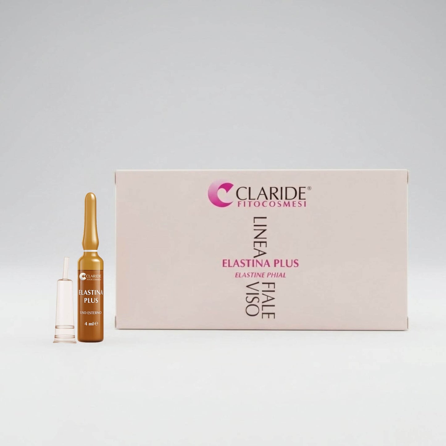 Scatola panna e fiala in vetro ambrato da 4ml con applicatore della Linea Fiale Viso Elastina Plus Claride Fitocosmesi. Siero concentrato intensivo (Elastine Phial) ad azione elasticizzante e rassodante per contrastare le rughe e la perdita di tono del viso, su fondo grigio chiaro.