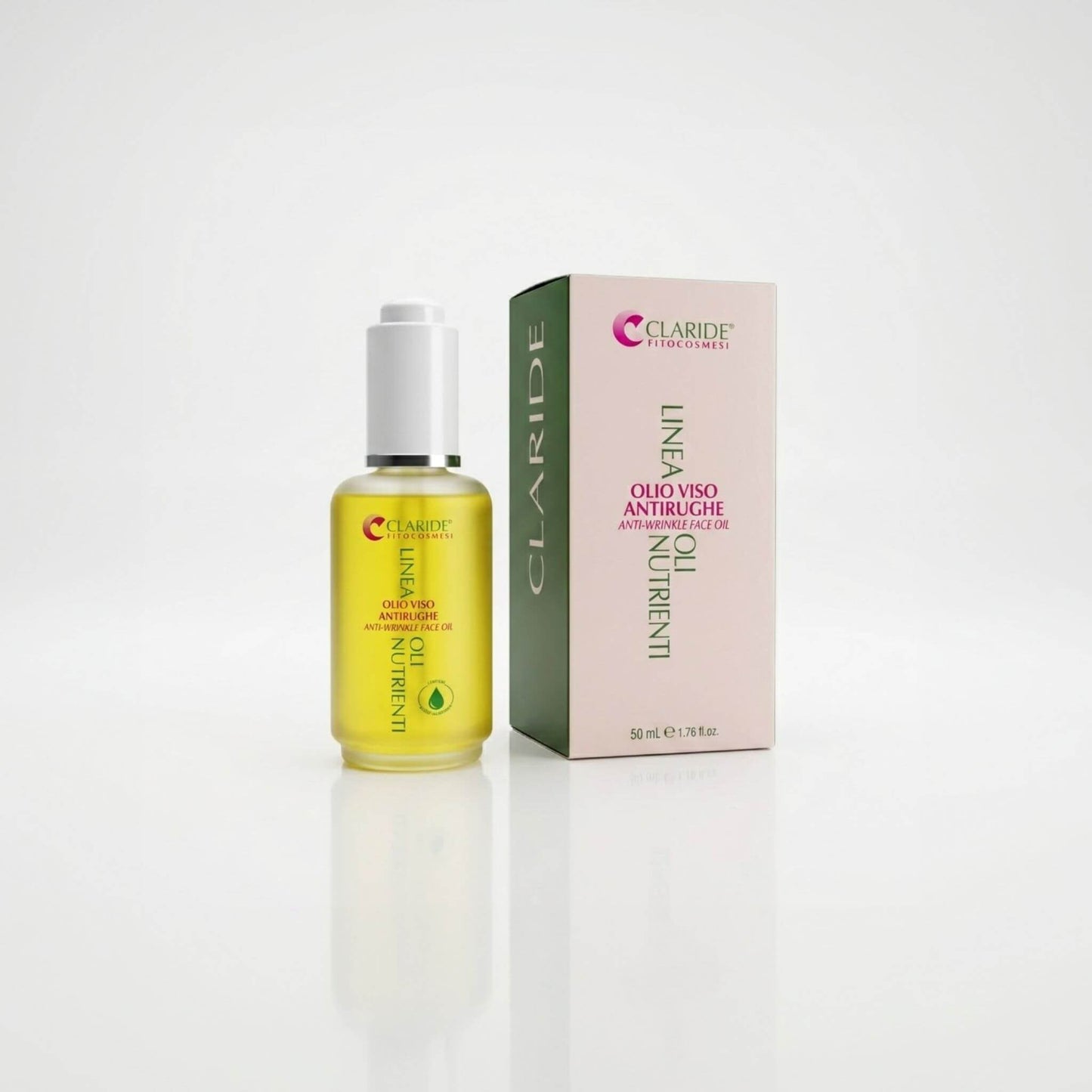 Boccetta di vetro con contagocce da 50ml con olio dorato e scatola rosa della Linea Oli Nutrienti Claride Fitocosmesi. Olio viso antirughe intensivo per un trattamento anti-age rigenerante e profondo, su fondo bianco con riflesso.