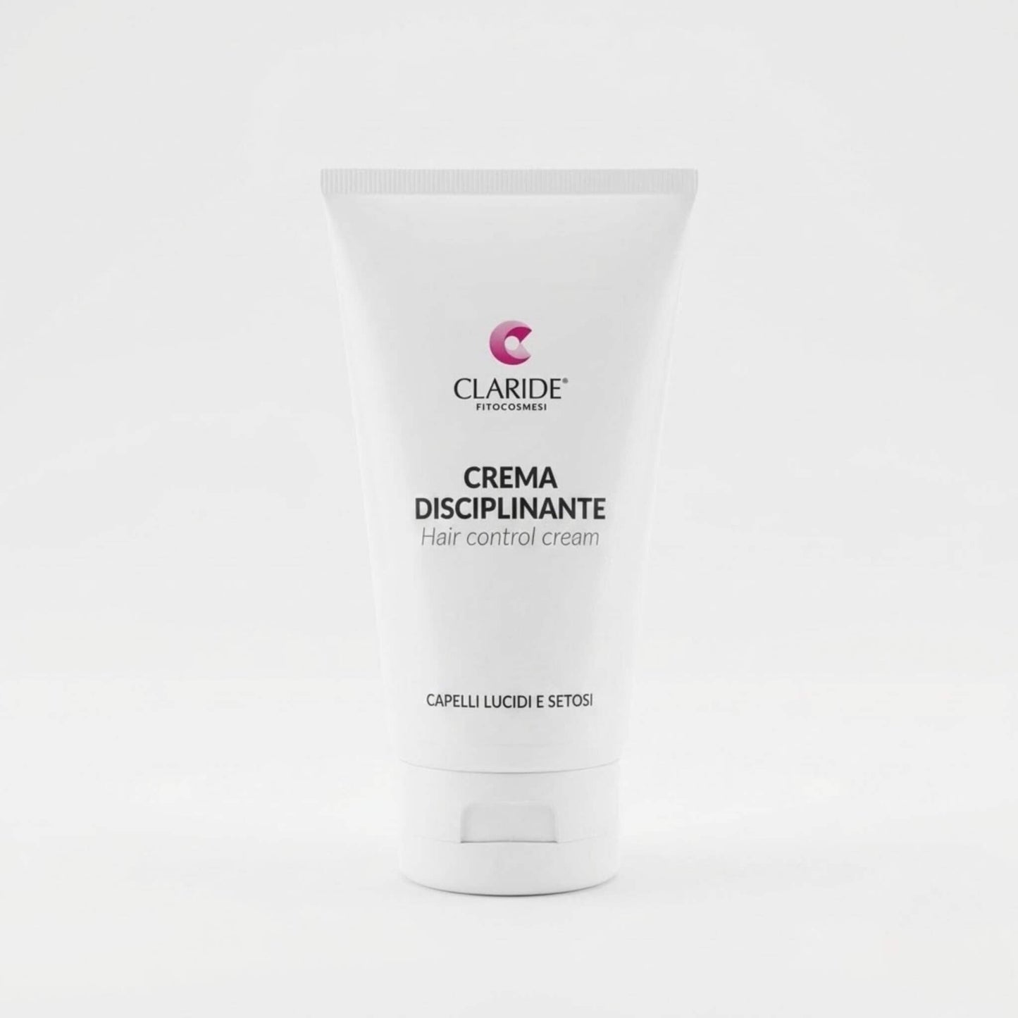 Tubo bianco della Crema Disciplinante Claride Fitocosmesi. Trattamento per capelli (Hair control cream) ad azione anticrespo, formulato per domare le lunghezze ribelli e rendere la chioma immediatamente lucida, setosa e facile da pettinare, su fondo bianco.