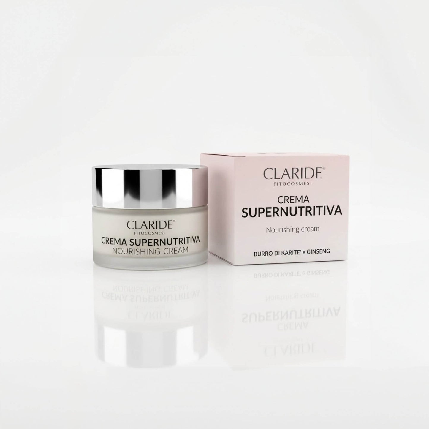 Vasetto in vetro satinato e scatola rosa della Crema Supernutritiva Claride Fitocosmesi. Trattamento viso nutriente (Nourishing Cream) con Burro di Karité e Ginseng per pelli secche e spente, su fondo bianco con riflesso.