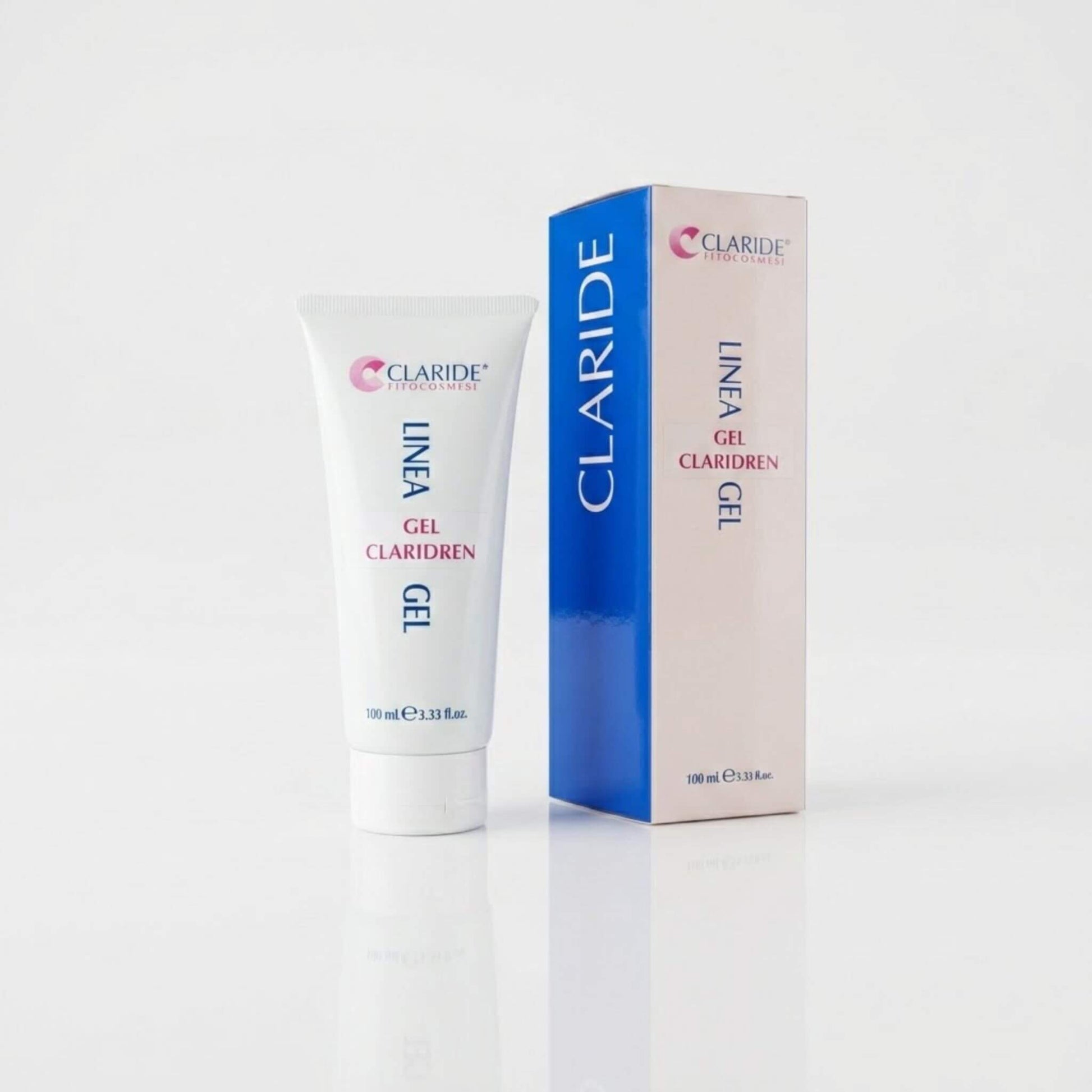 Tubo bianco e scatola coordinata con pannello blu intenso del Gel Claridren Claride Fitocosmesi. Trattamento corpo in gel ad azione ultra-drenante e defaticante per alleviare il senso di pesantezza e la ritenzione idrica, su fondo bianco neutro con riflesso.