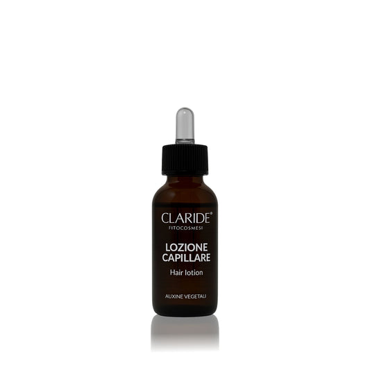 Flacone in vetro da 50 ml con contagocce della Lozione Capillare Anticaduta Claride Fitocosmesi a base di Auxine Vegetali e Pantenolo per stimolare la crescita e rinforzare i capelli.