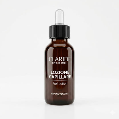Flacone in vetro ambrato con contagocce della Lozione Capillare Claride Fitocosmesi. Trattamento urto a base di Auxine Vegetali per stimolare il cuoio capelluto, rinforzare le radici e contrastare l'indebolimento dei capelli, su fondo bianco.