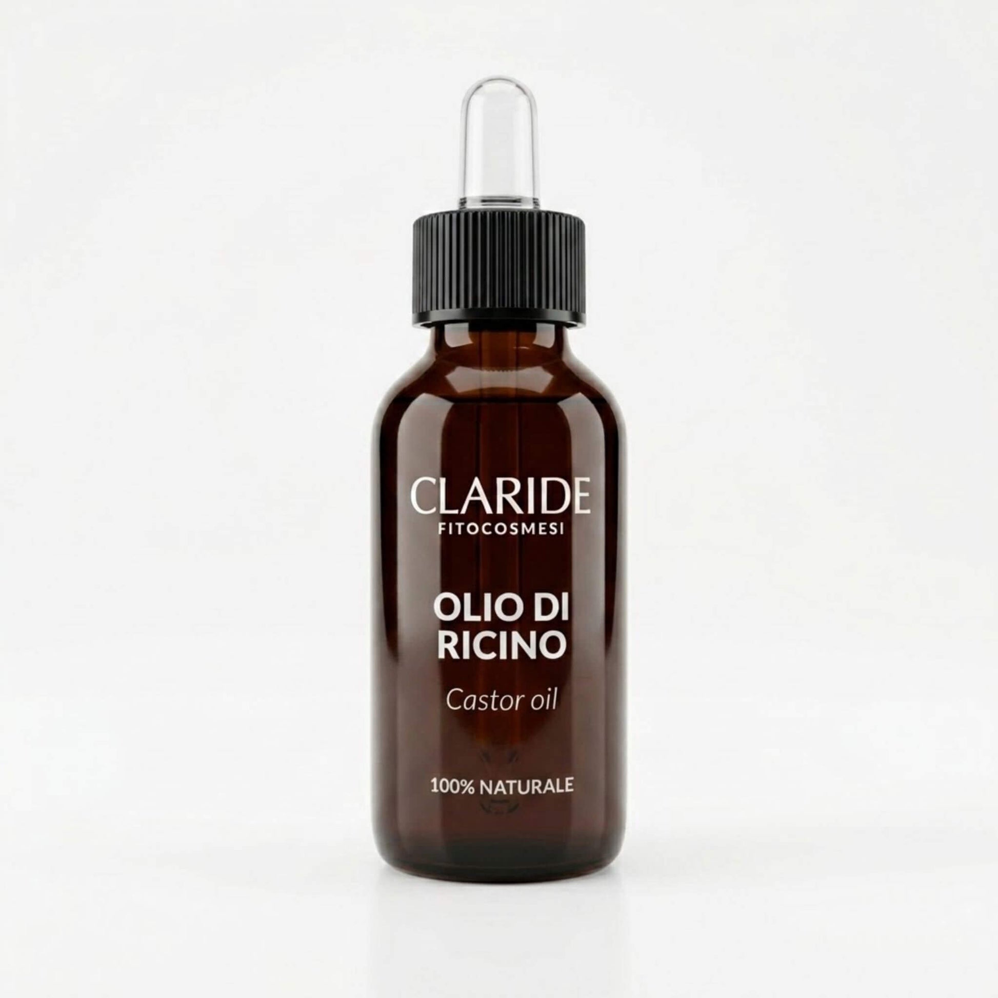 Flacone in vetro ambrato con contagocce di Olio di Ricino 100% Naturale Claride Fitocosmesi. Elisir botanico puro e multiuso, ideale per rinforzare, infoltire e nutrire ciglia, sopracciglia, unghie e capelli sfibrati, su fondo bianco.