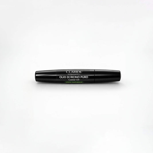 Flacone cilindrico nero lucido di Olio di Ricino Puro Claride Fitocosmesi con applicatore a scovolino per ciglia e sopracciglia. Scritta 100% Naturale in evidenza.
